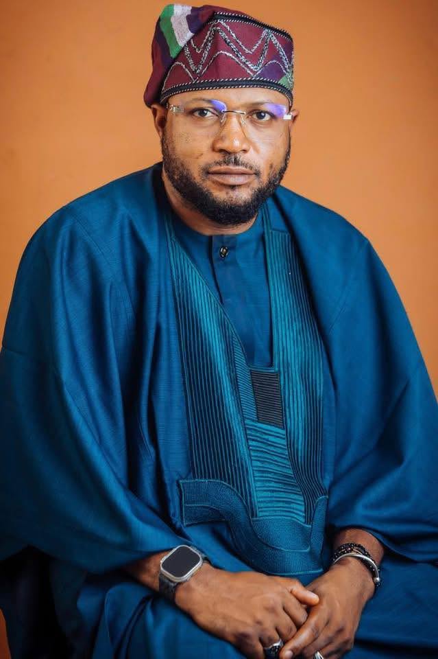 Hon. Dalhatu Ezekiel Musa, widely known as MC Gida Gida, in traditional agbada and cap